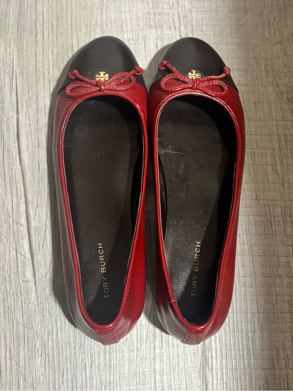 Tory Burch Red Leather Ballet Flats with Black Cap Toe and Gold Logo